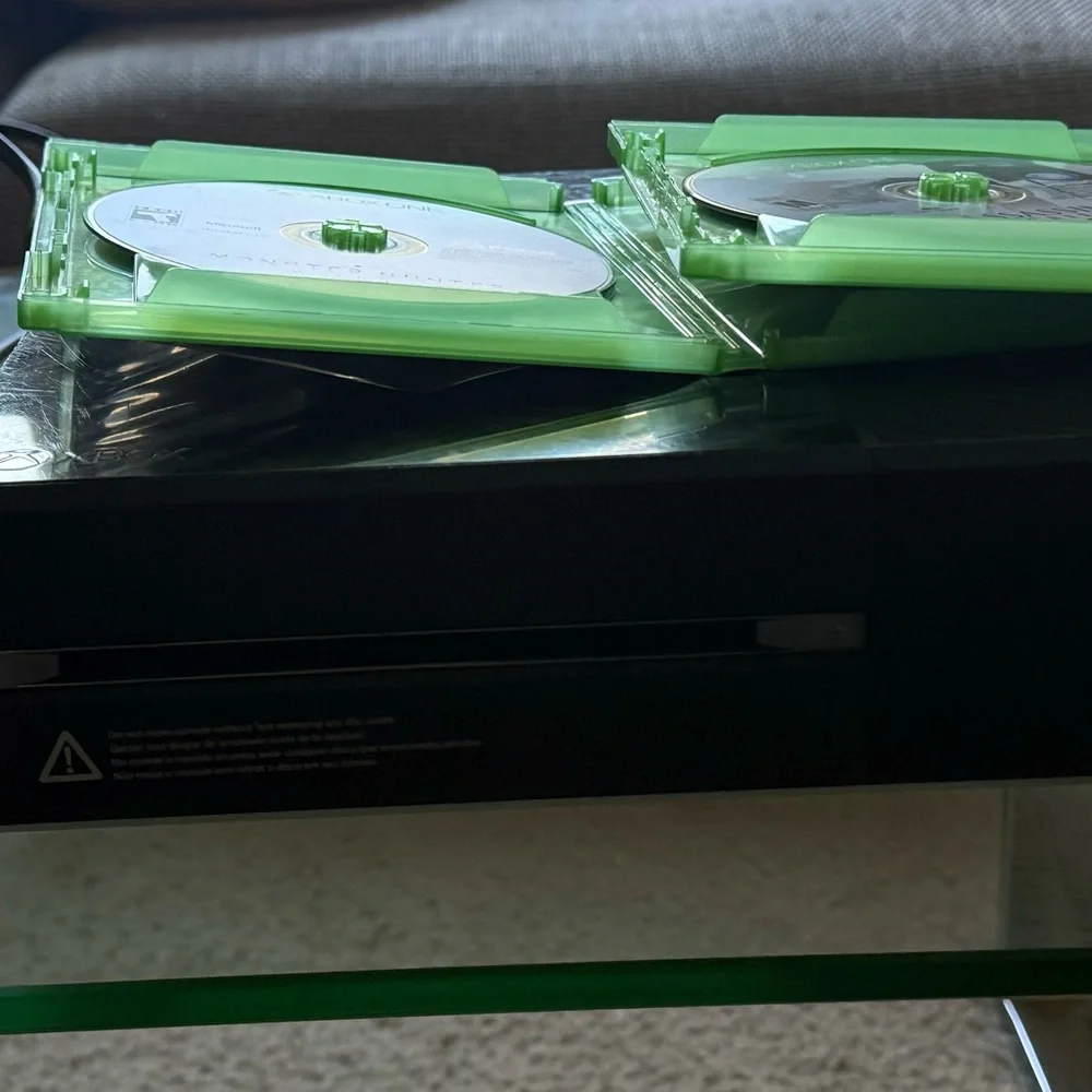 One Console with Red Controller and Games